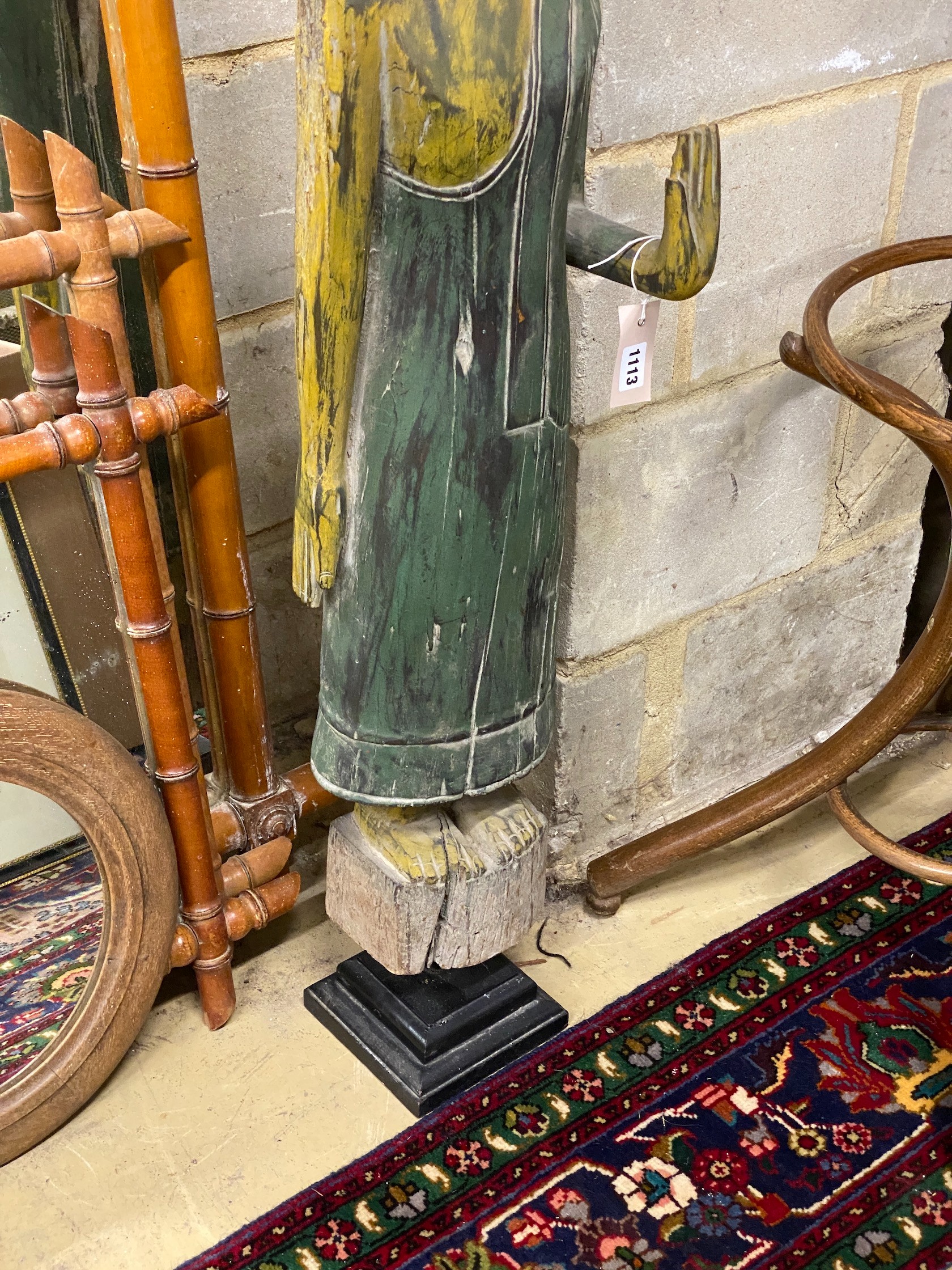 A painted carved wood standing Buddha ornament, height 116cm